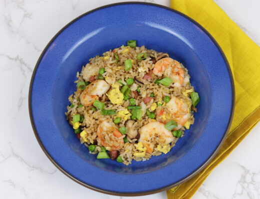 Shrimp fried rice in a blue bowl